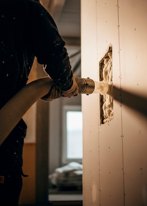 Insuflado de aislamiento en cámara de pared